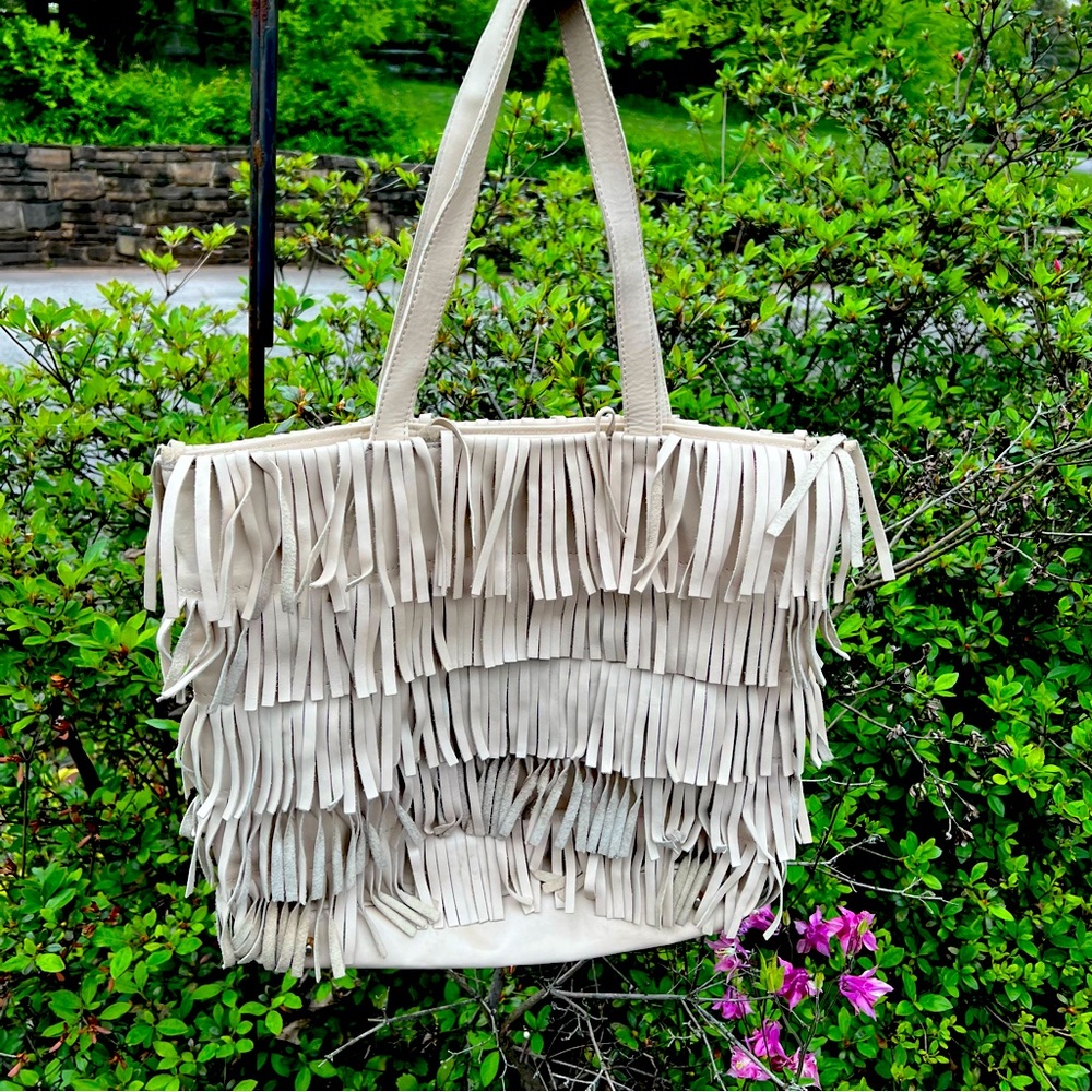 Guia’s Italian leather fringe bag